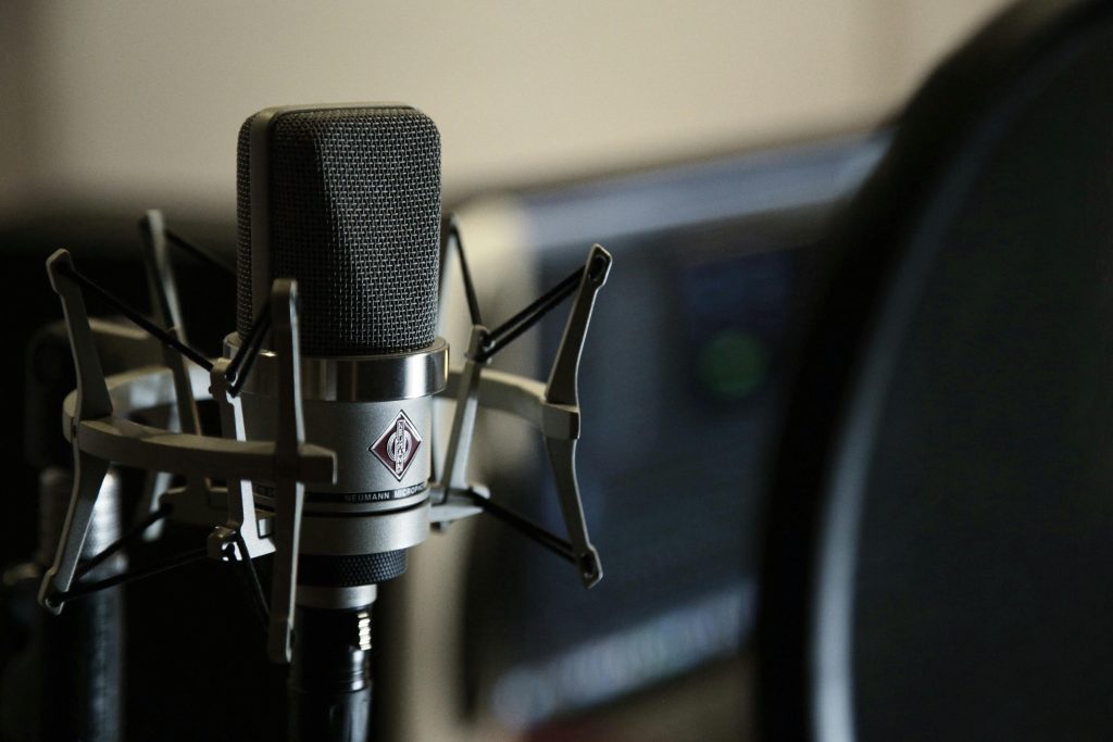 pexels-photo-3710191-3710191 Detailed view of a condenser microphone in a recording studio setting.